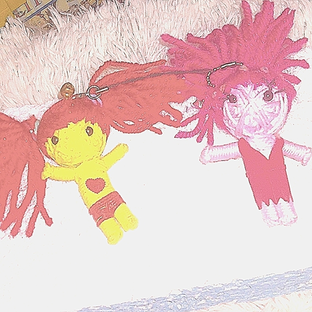 Set of 2 string dolls
